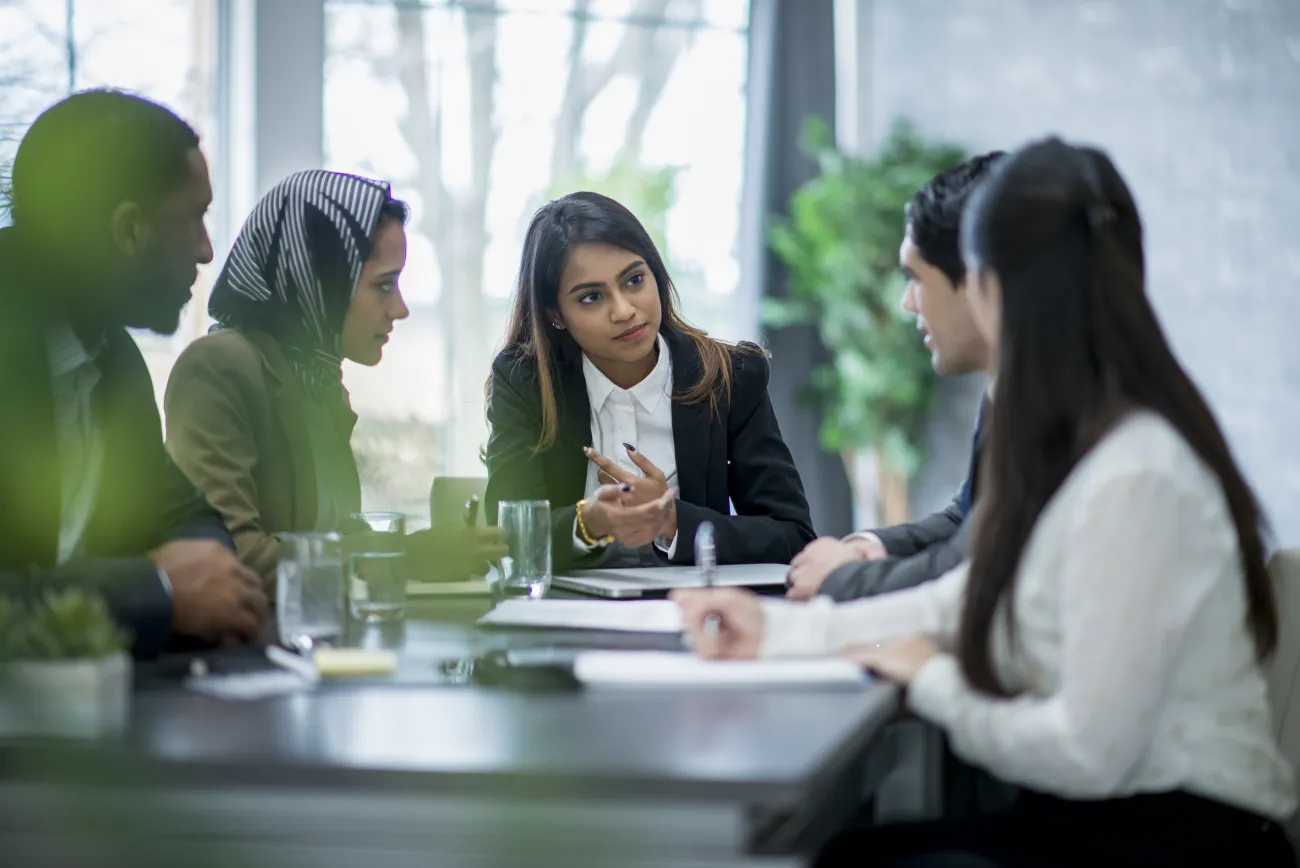 Migration agents around a table